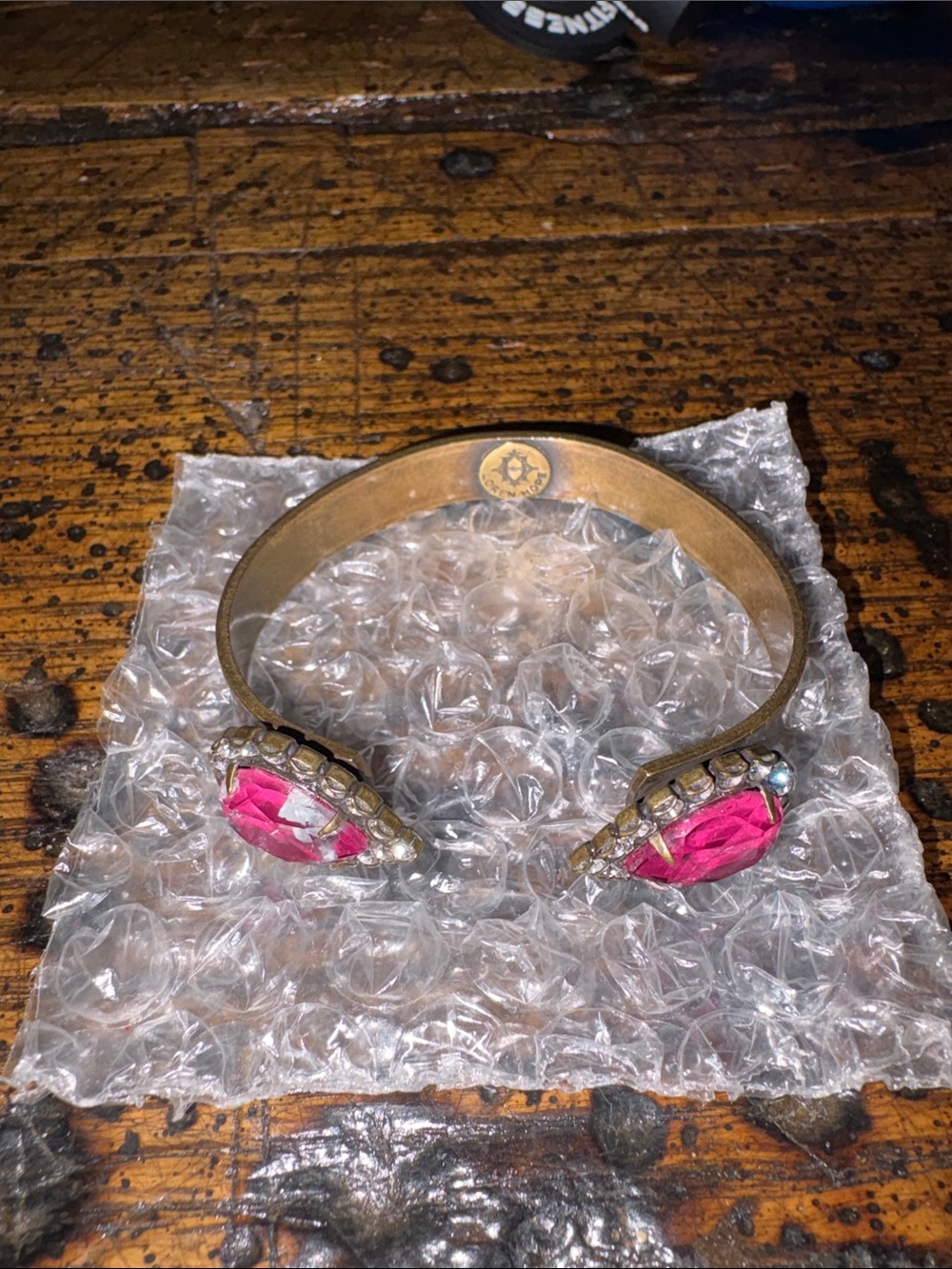 Gold-Tone Cuff Bracelet with Pink Crystal Accents